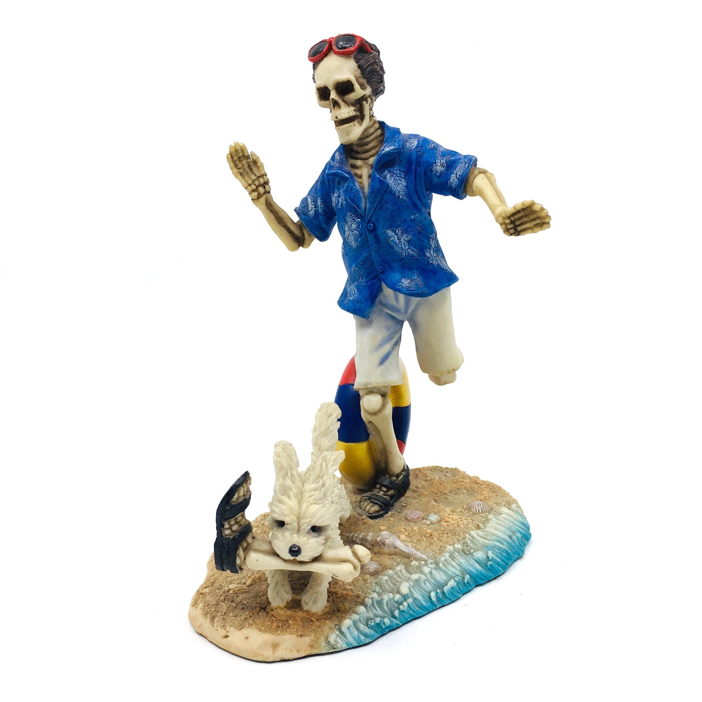 Skeleton Beach Man Making Fetch for His Dog Figurine