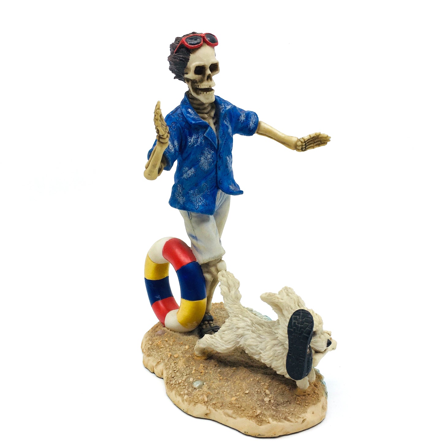 Skeleton Beach Man Making Fetch for His Dog Figurine