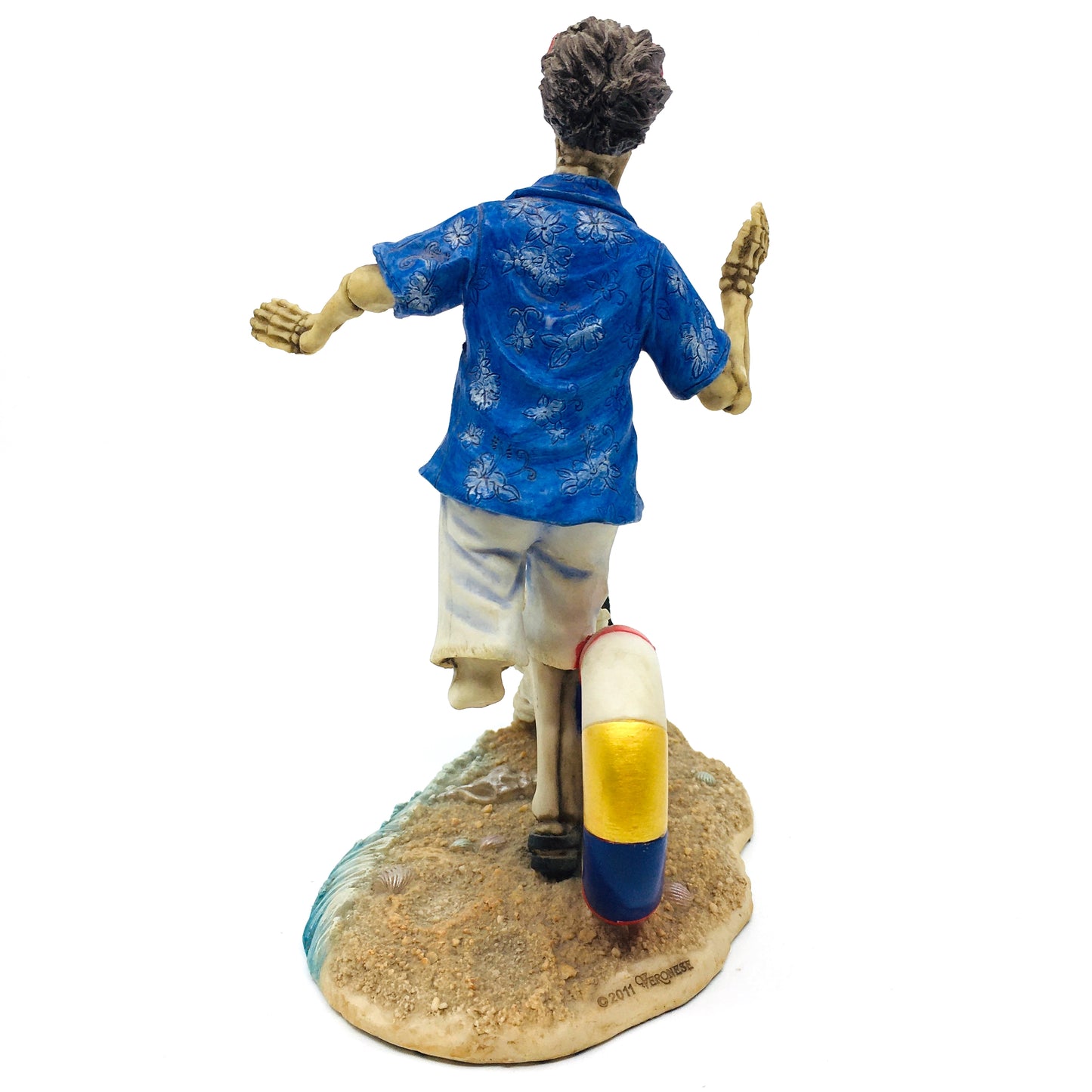 Skeleton Beach Man Making Fetch for His Dog Figurine