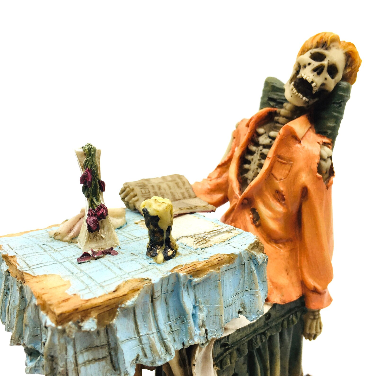 Male Skeleton Figurine Waiting for the Perfect Meal