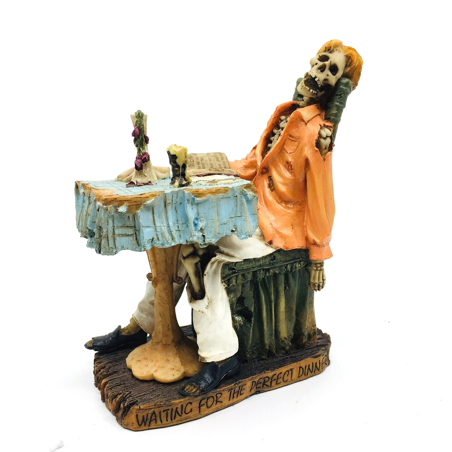 Male Skeleton Figurine Waiting for the Perfect Meal