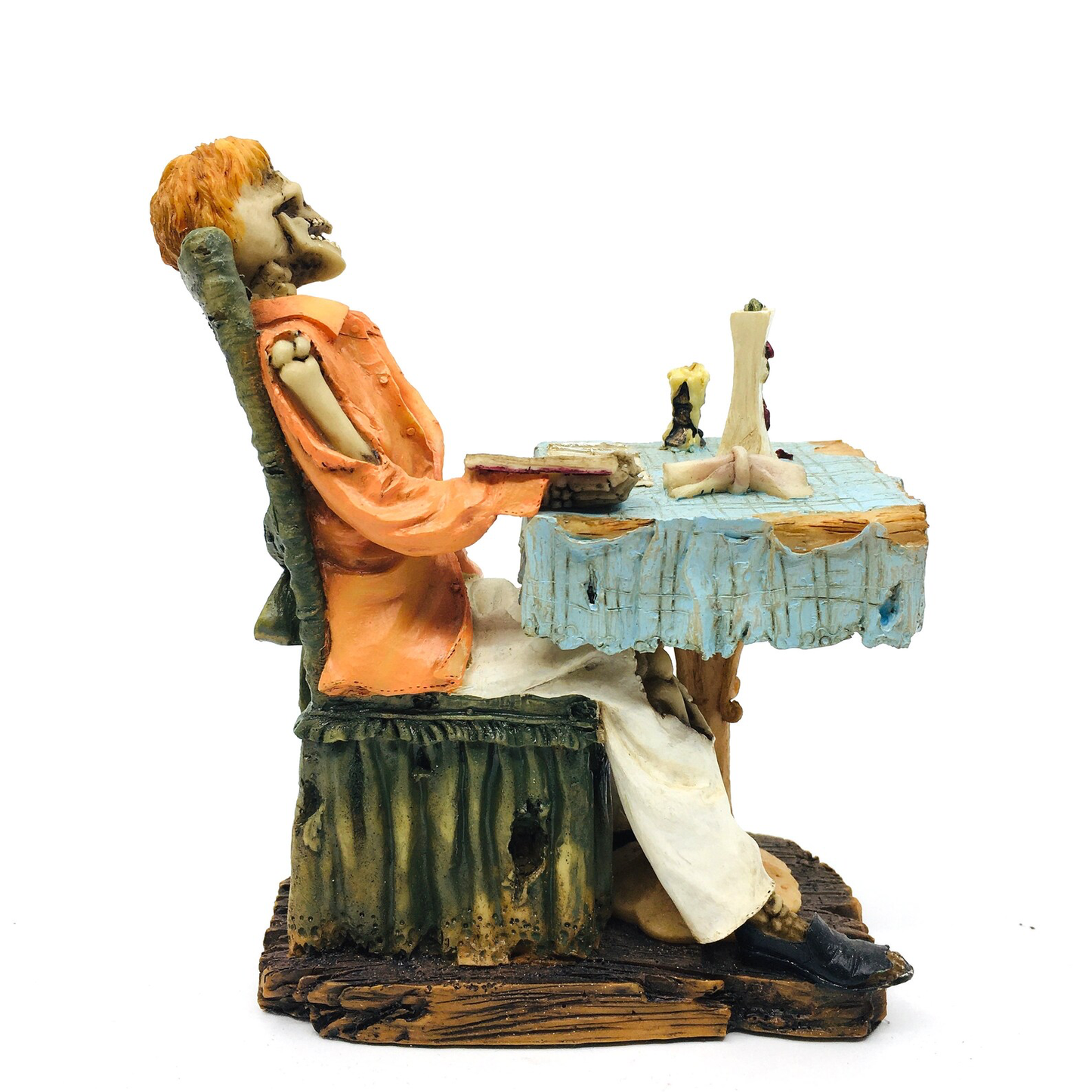 Male Skeleton Figurine Waiting for the Perfect Meal