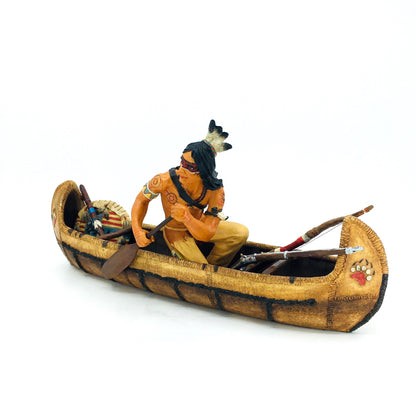 Native American Indian Warrior Figurine in a Canoe