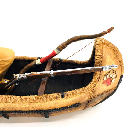 Native American Indian Warrior Figurine in a Canoe