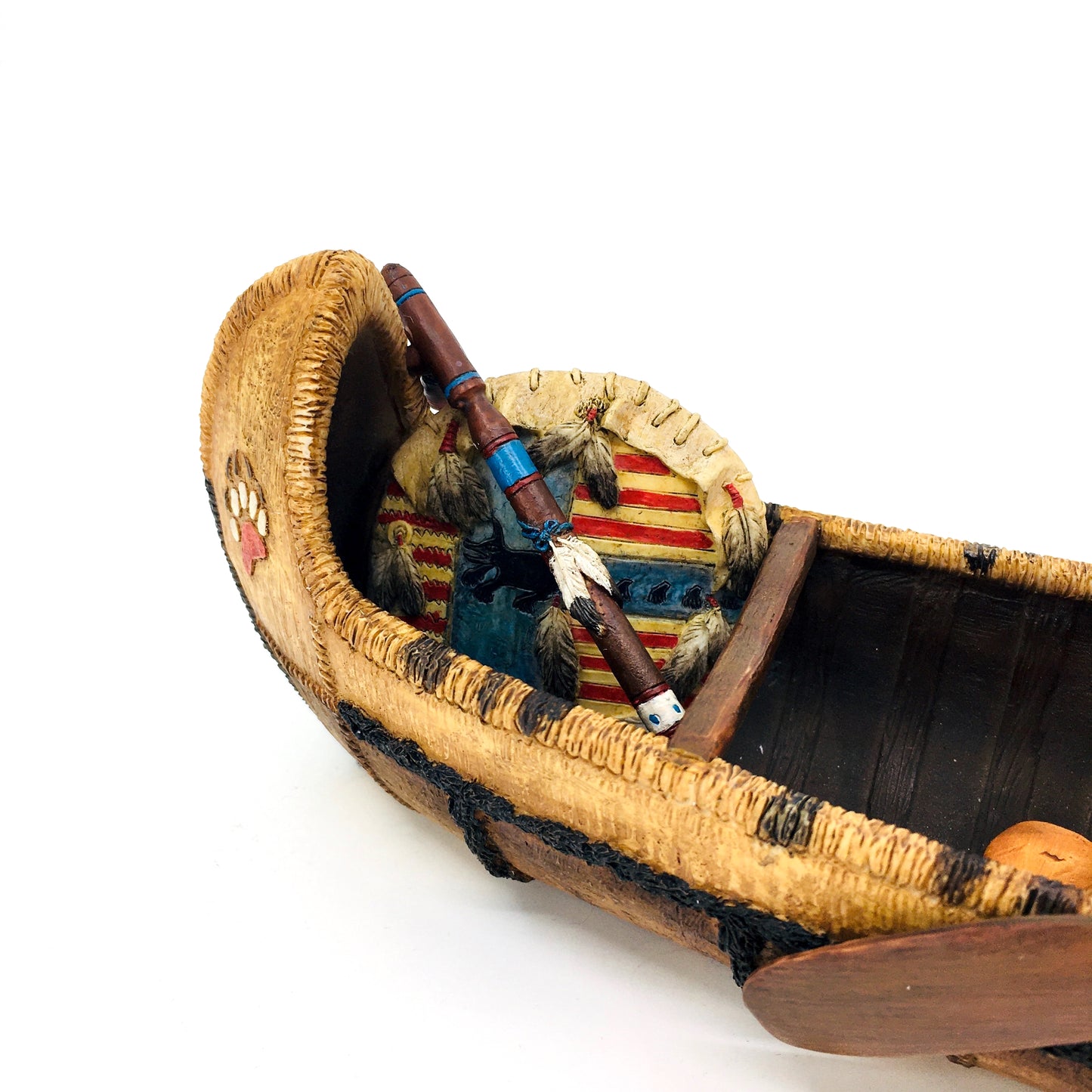 Native American Indian Warrior Figurine in a Canoe